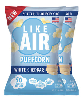 Like Air Puffcorn White Cheddar bag close-up, light melt-in-mouth texture for on-the-go snacking