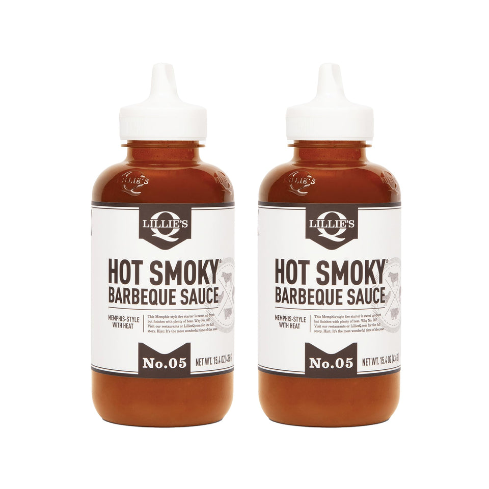 Lillie's Q hot smoky sauce bottle showcases bold flavor for grilling.