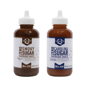 Lillie’s Q smoky zero sauce bottle pour for rich, sugar-free flavor.