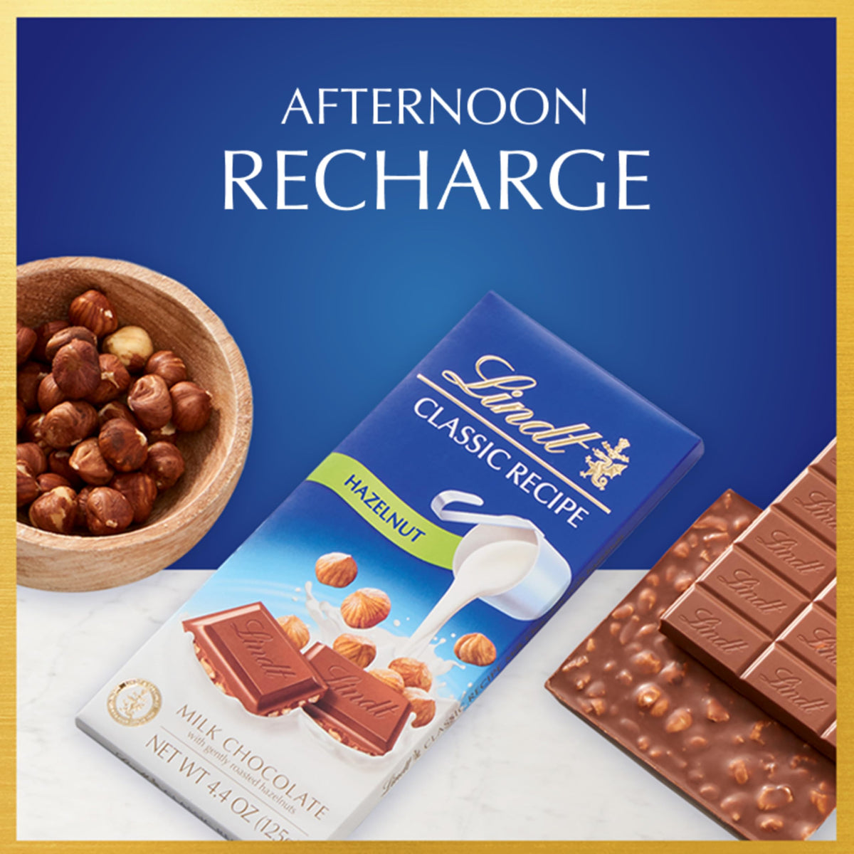 Lindt Classic Recipe Hazelnut Milk Chocolate Bar close-up with hazelnut pieces and creamy melt