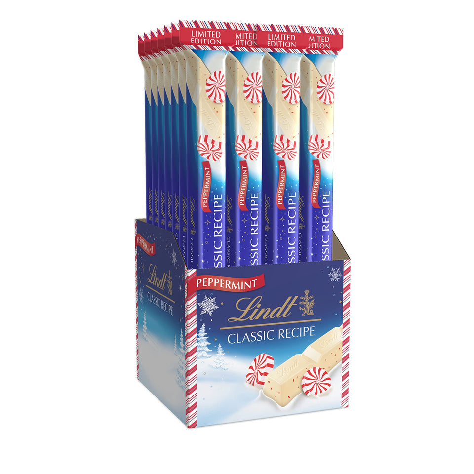 Lindt Classic Recipe Holiday White Chocolate Peppermint Stick close-up, showcasing creamy texture.