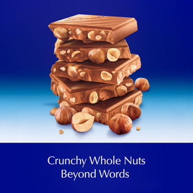 Visible hazelnuts and caramelized pieces in Lindt Classic Recipe bar, premium indulgence.