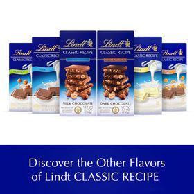 Melt-ready texture of Lindt Classic Recipe Whole Hazelnut Milk Chocolate Bar inviting a smooth bite.