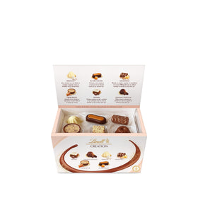 Close-up of Lindt Creation Dessert assortment showing white, dark, and milk chocolates.