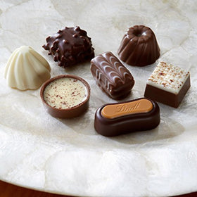 Lindt Creation Dessert box reveals creme brulee, tiramisu, and other flavors.
