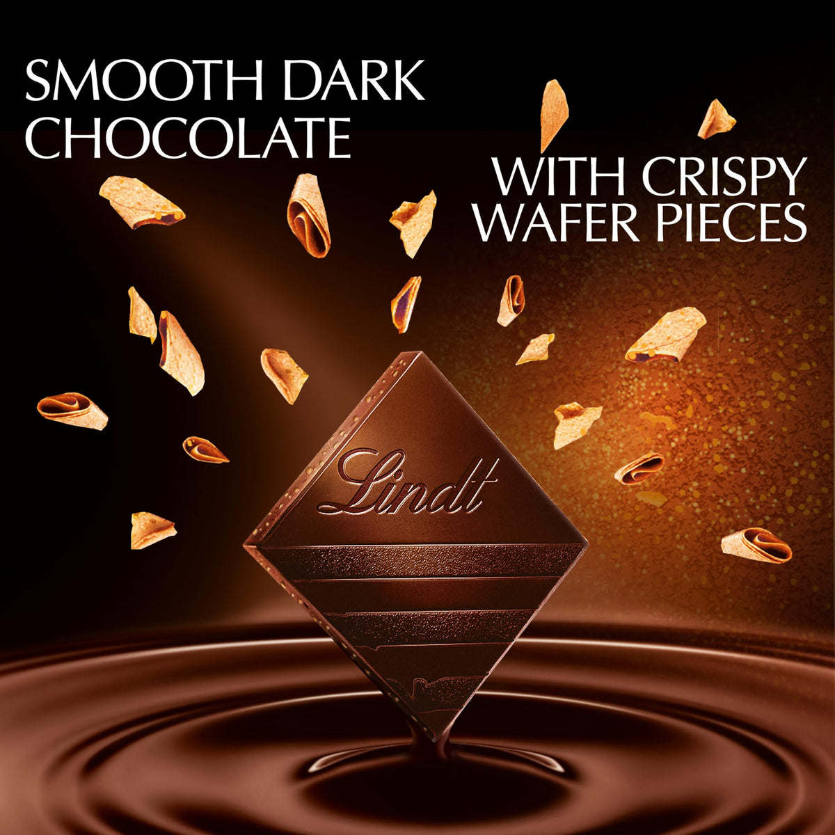 Lindt EXCELLENCE Crispy Wafer pieces closeup highlights crisp wafer crunch with rich chocolate.
