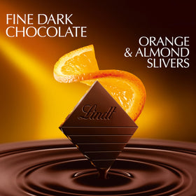 Lindt EXCELLENCE Intense Orange bar break shows bite-size squares for sampling.