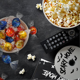 Lindt Lindor assorted truffles bag back, highlights five flavors for moments of indulgence.
