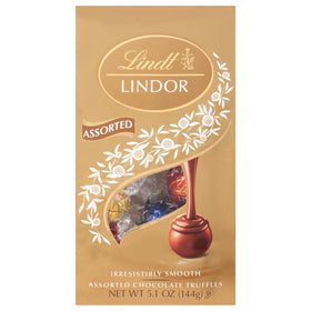 Lindt Lindor assorted truffles with glossy shells for premium indulgence.