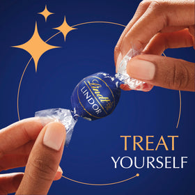 Lindt LINDOR dark shell emphasizes premium craftsmanship and aroma