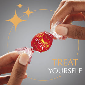 Lindt LINDOR fudge swirl truffle with velvety filling.