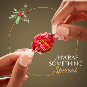 Lindt LINDOR gift box open showcasing festive packaging