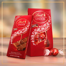 Individually wrapped Lindt LINDOR Milk Bar for convenient on-the-go treats.