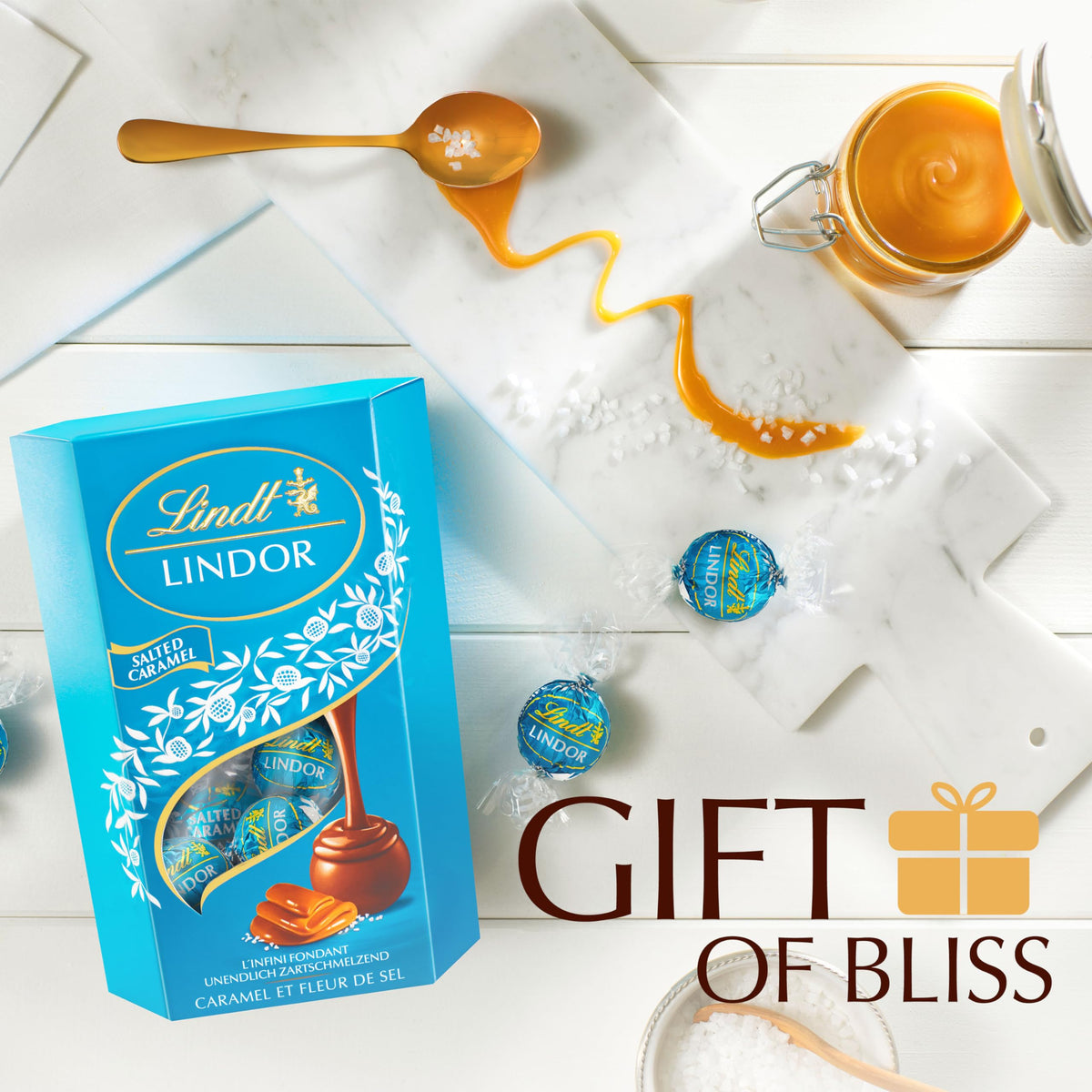 Lindt Lindor Milk Chocolate Salted Caramel truffles in a premium gift box, perfect for celebrations.
