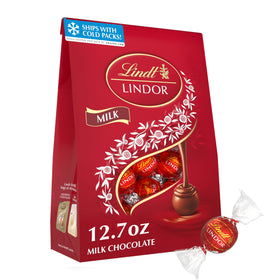 Lindt LINDOR milk chocolate truffles bag with smooth centers, ideal for sharing.