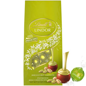 Lindt Lindor Pistachio milk chocolate truffles shell close-up showing smooth melt