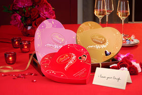 Lindt Lindor white chocolate shell surrounds a silky strawberries and cream filling.