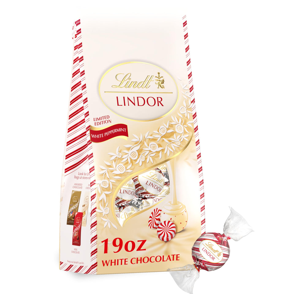 Lindt LINDOR White Peppermint Truffles bag front, festive packaging ideal for gifting and sharing.