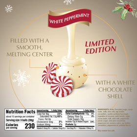 Lindt LINDOR White Peppermint Truffles cross-section reveals smooth peppermint center.