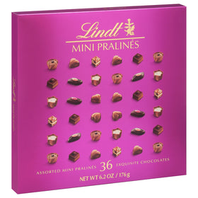Lindt Mini Pralines gift box with ribbon on table