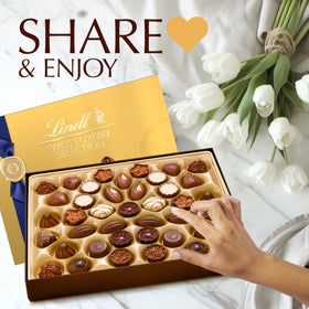 Lindt Swiss Luxury Selection pralines in milk, dark, and white chocolate for varied tasting.