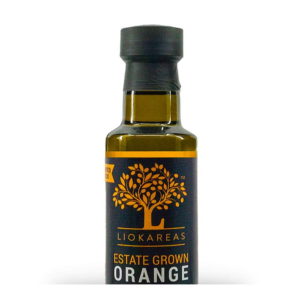 Closeup of orange peel in Liokareas oil reveals fresh citrus aroma.