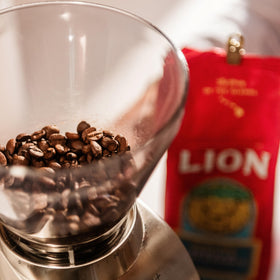 Lion Coffee 10oz bag vacuum-sealed to lock in freshness