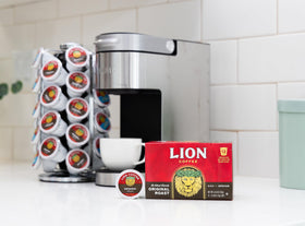 Lion Coffee Arabica Beans pods close-up for premium flavor in every brew.