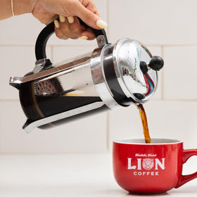 Lion Coffee Light Roast Arabica beans delivering bright, delicate notes