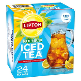 Lipton tea bags steeping in hot water to release aroma and smooth flavor.