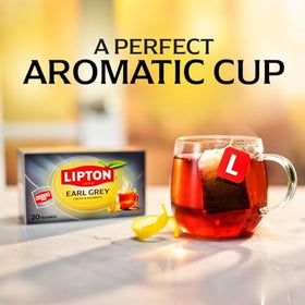 Lipton Earl Grey tea bags steeping in a cup, citrus-forward aroma.