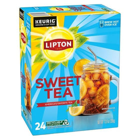Tea cup with ice cubes and poured Lipton tea