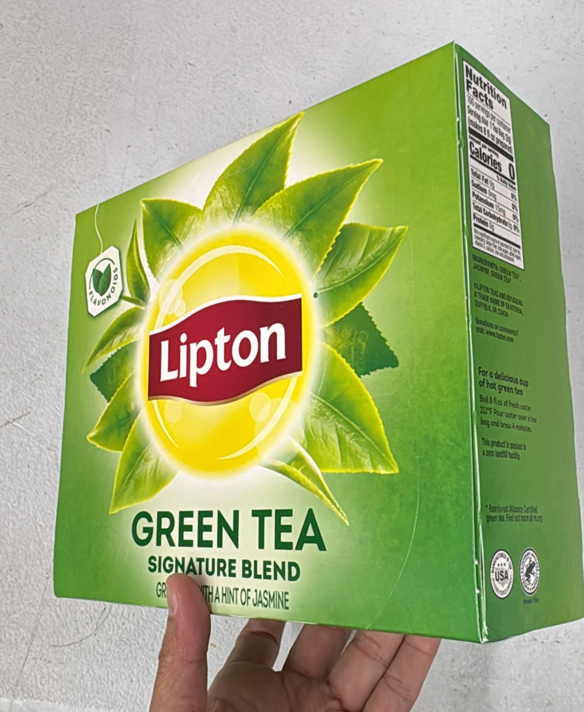 Lipton logo and tea bags close-up ready for a fresh cup.