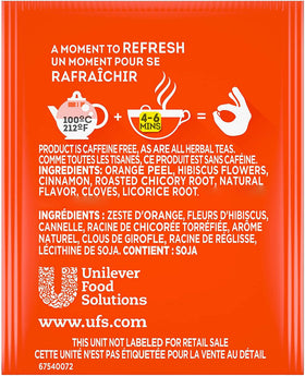 Lipton orange herbal tea boxes arranged on a shelf.