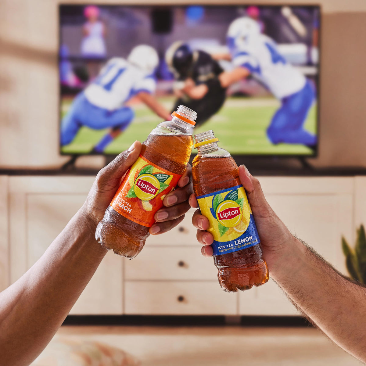 Lipton pack of 12 bottles displayed on fridge shelf.