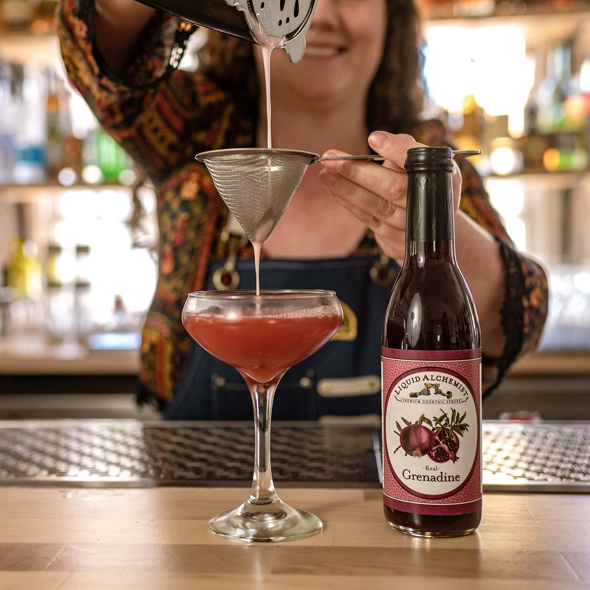 Liquid Alchemist Grenadine product packaging emphasizes premium gifting presentation