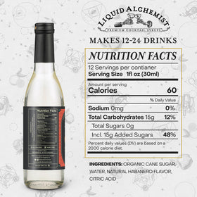 Liquid Alchemist habanero syrup pour closeup adds spicy kick to drinks.