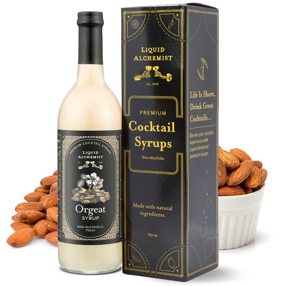 Liquid Alchemist Orgeat Syrup bottle on bar for authentic almond flavor in cocktails