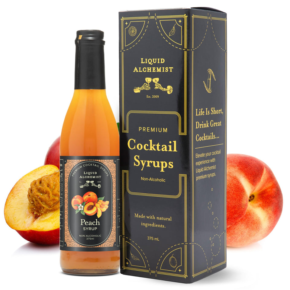 Liquid Alchemist Peach Syrup bottle pour showing vibrant peach flavor for cocktails