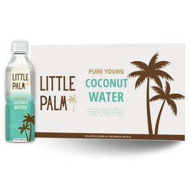 Little Palm coconut water pours from a young coconut into a glass for post-workout refreshment
