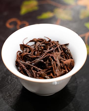 LIUXIA CHA Yunnan black tea reveals a smooth, golden liquor
