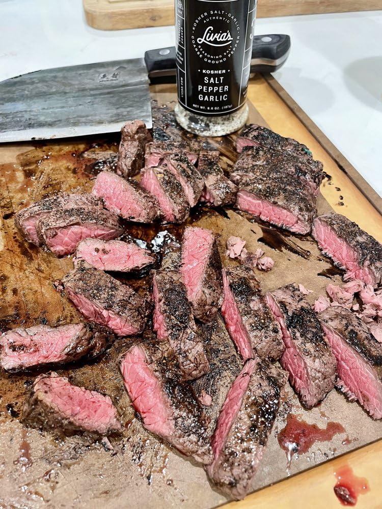 Steak seasoned with Livia's Salt Pepper Garlic for enhanced savory crust