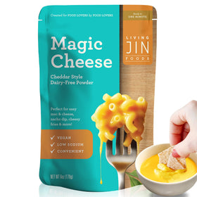 Living Jin Vegan Magic Cheese Sauce powder in a jar showing dairy-free cheddar flavor