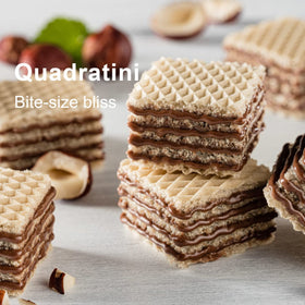 Loacker Quadratini hazelnut wafers served with coffee for a quick, indulgent break.