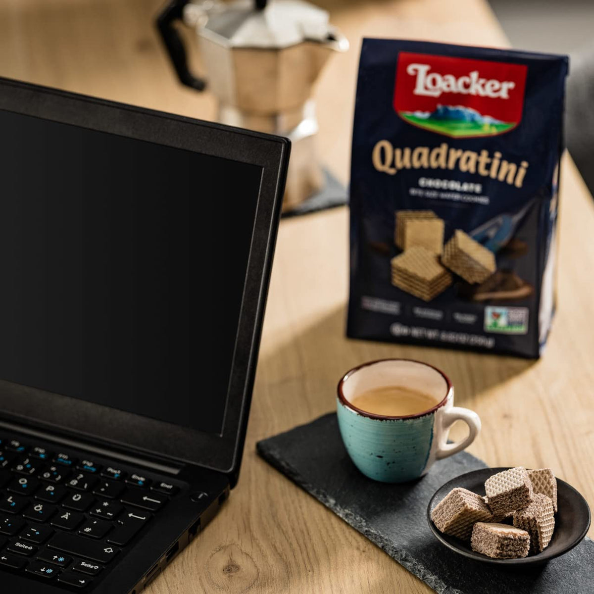 Dip Loacker Quadratini into melted chocolate for a quick dessert idea.
