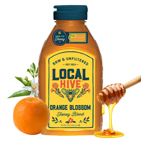 Local Hive Orange Blossom Honey bottle on a kitchen counter showing bright citrus flavor for tea