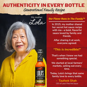 Lola's Family Reserve hot sauce dramatic pour captured mid-flow.