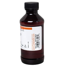 LorAnn Mango SS Flavor bottle being poured for ice cream or cake.