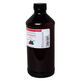 LorAnn Strawberry SS flavor bottle pour shot showing easy dispersion in recipes.