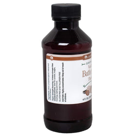 Pouring LorAnn Vanilla Butternut Super Strength to boost desserts.